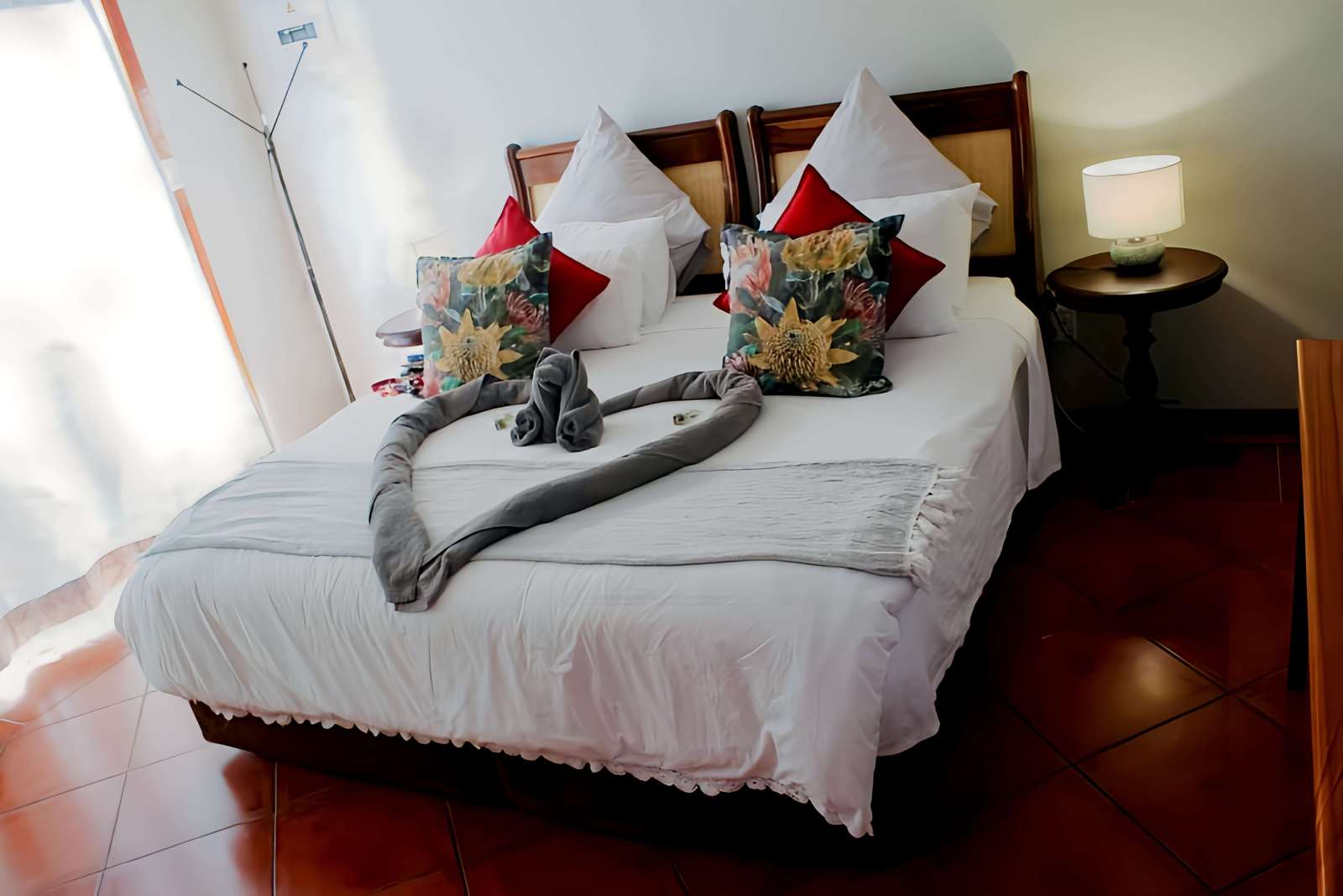 Romantic cabin bedroom at La Montagne Heritage Cabin Jacuzzi Suite